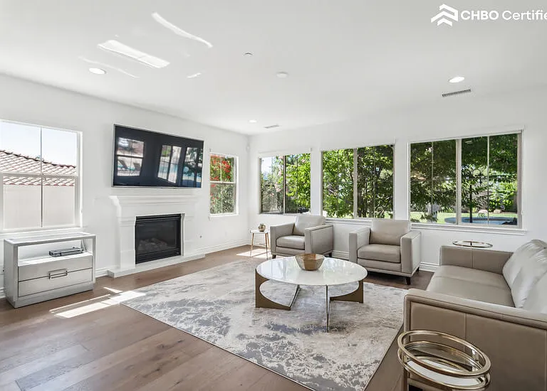 Family Room w/ Natural Light plus 75" Smart TV and Fireplace