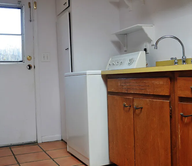 Sink with washing machine.