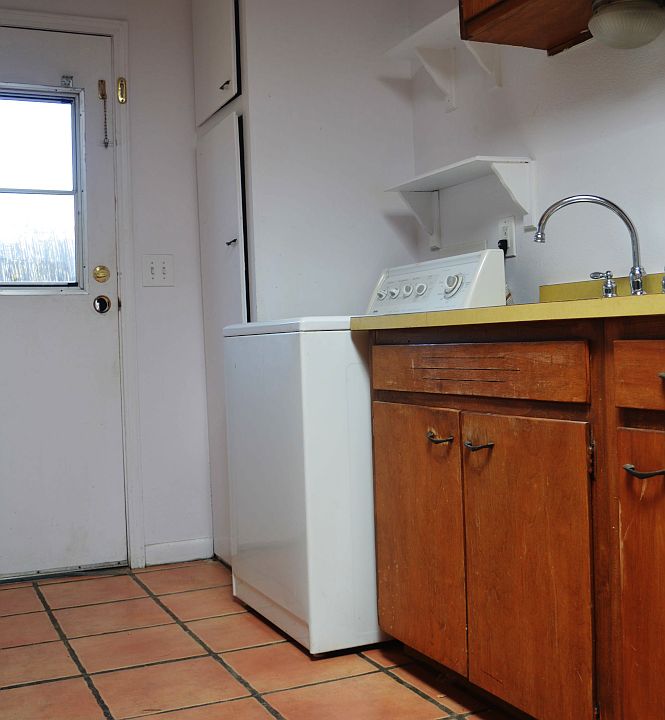 Sink with washing machine.