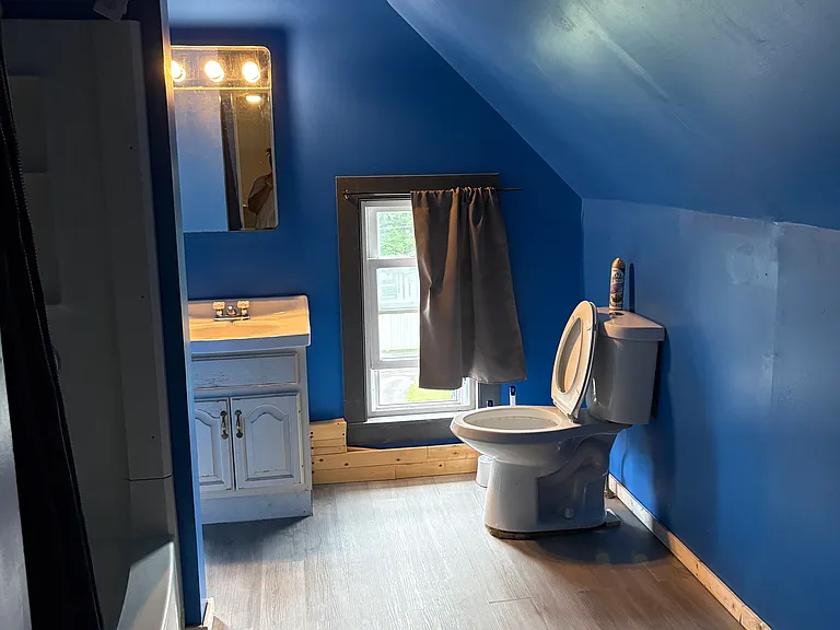 Cross view of large bathroom