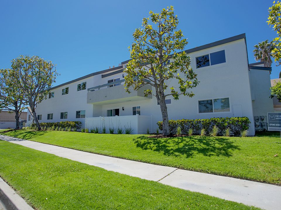 Lush Landscaped front of building.
