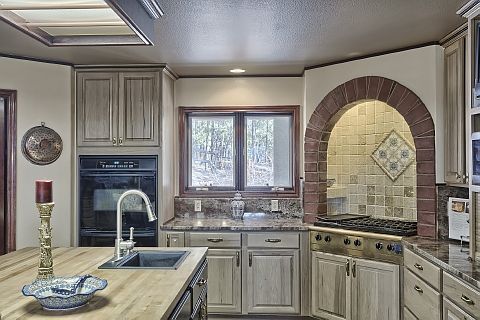 Walk-in pantry, two sinks, range top & double