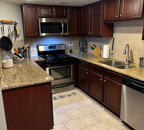 Galley kitchen. Lots of counter top space.