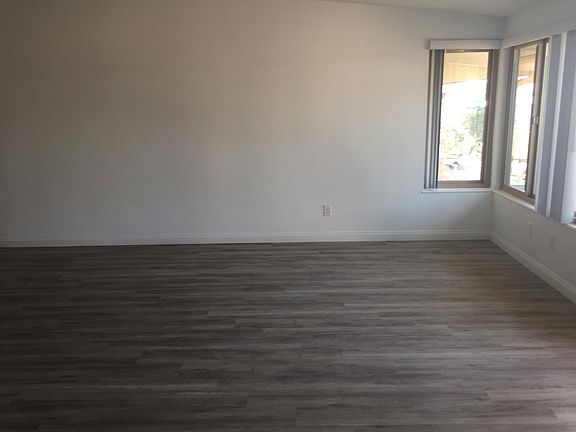 Open concept dining area off of breakfast bar