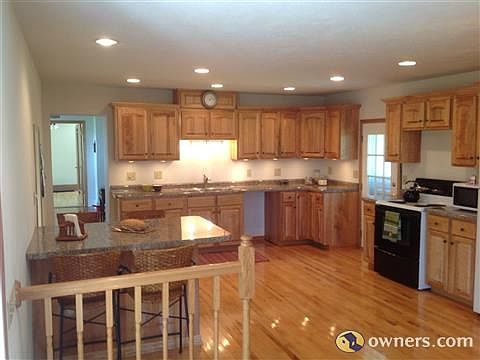 Kitchen w/ Custom-built birdseye maple cabinets