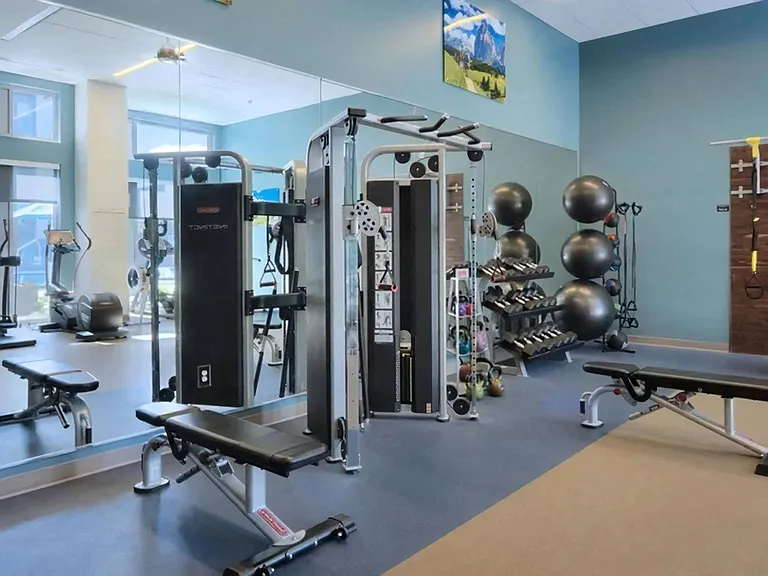 Resident Gym Featuring Free Weights, Machines, and Stability Balls
