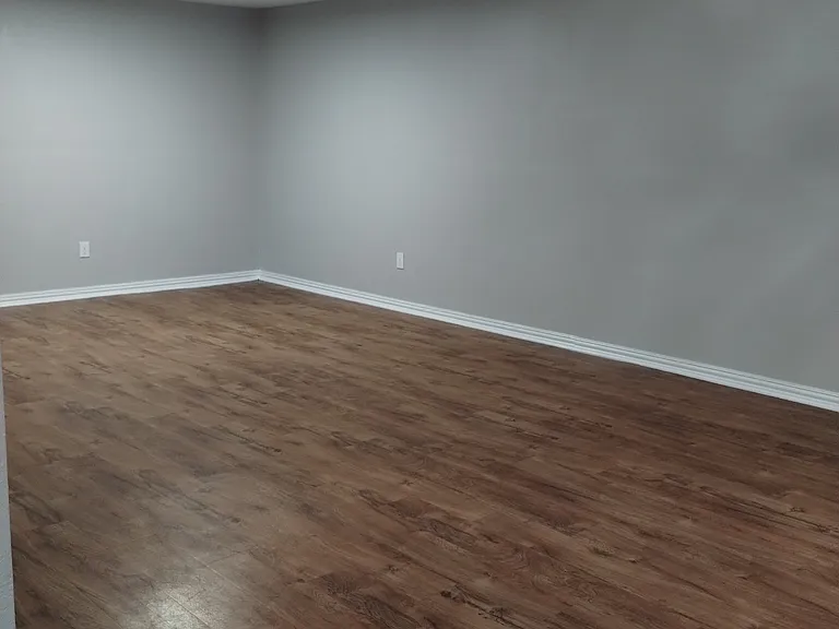 Look at our huge enormous living room/dining area to our 1 bedroom floor plan