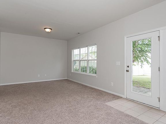 Living room with french doors - backyard to right