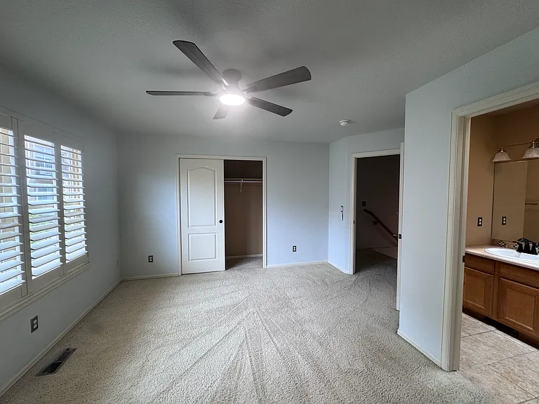 1st bedroom with it's own bathroom and closet on 2nd floor