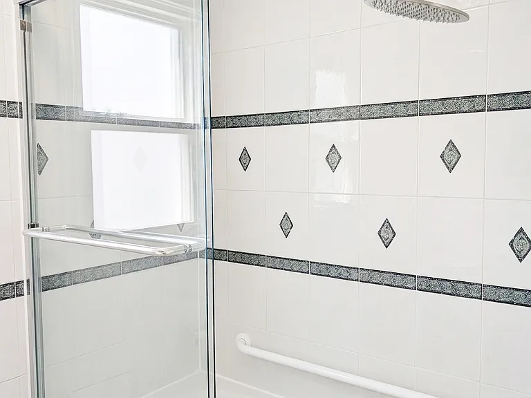 Spacious deep tub with doors