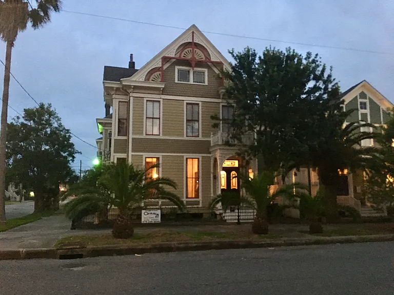 Apt 1 is the second story set of windows across the front