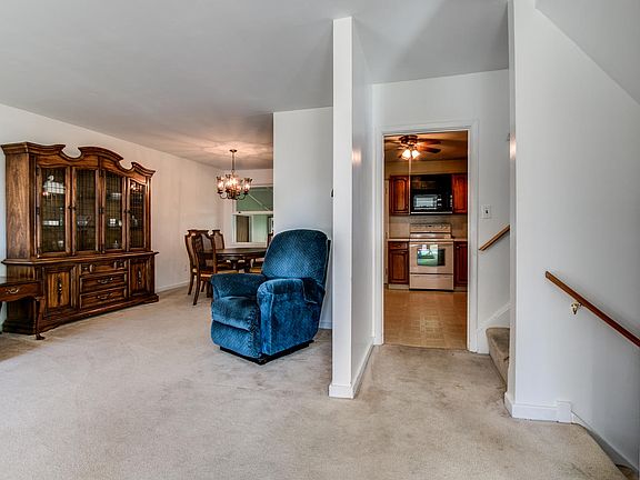 Entry foyer opens into formal living room