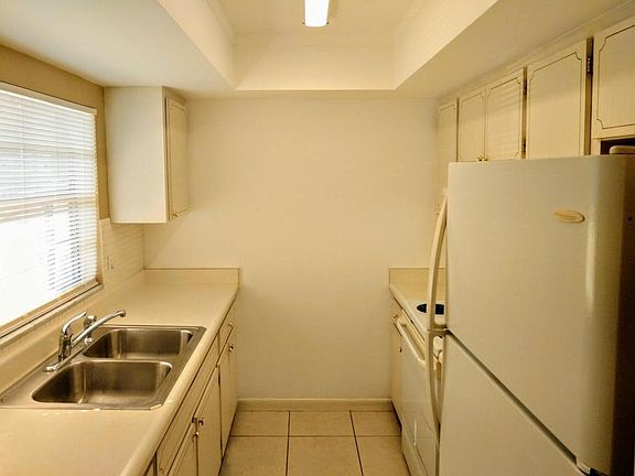 Crisp clean galley kitchen