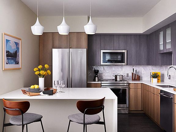 Fully-Equipped Kitchens with Stainless Steel Appliances