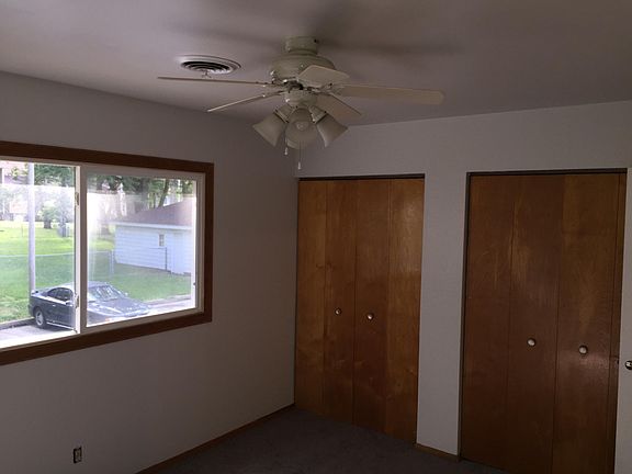 bedroom view of double closets
