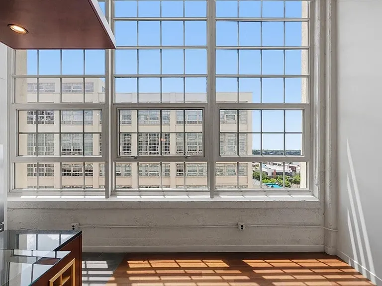 Ceilings are 15 feet tall. Windows are 12 feet tall