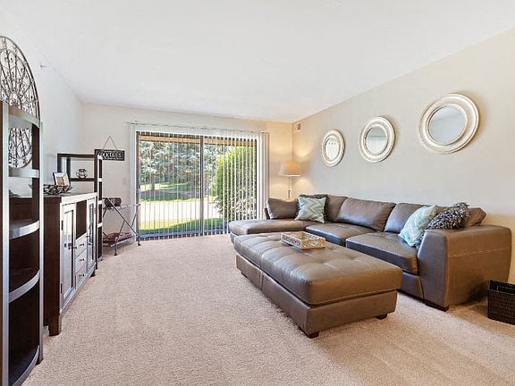 Open and airy Living Area with natural light at Dover Hills Apartments Kalamazoo MI