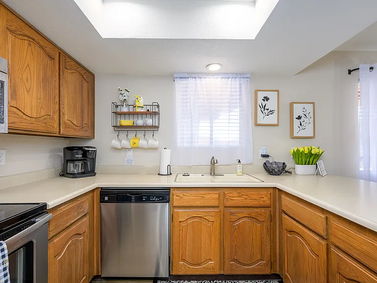 Privacy drapes in kitchen and dining room. You can see out, they can not see in.