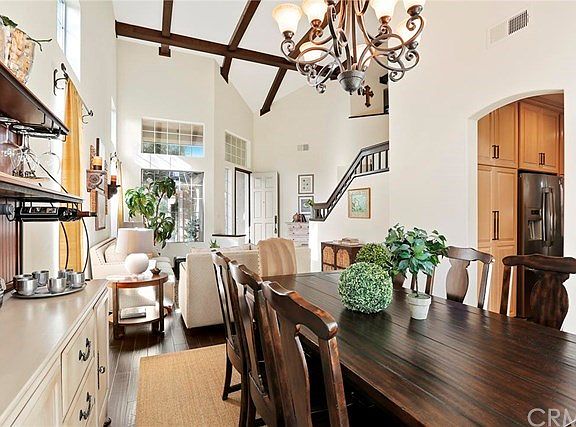 Reverse View of Dining Room and Living Room Looking toward Front Door