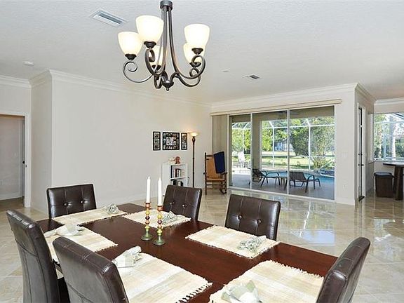 3rd image of 400 Lake Of The Woods Dr