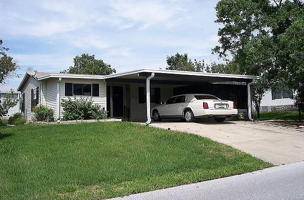 Two Car Carport & Utility Room with Washer & Dryer