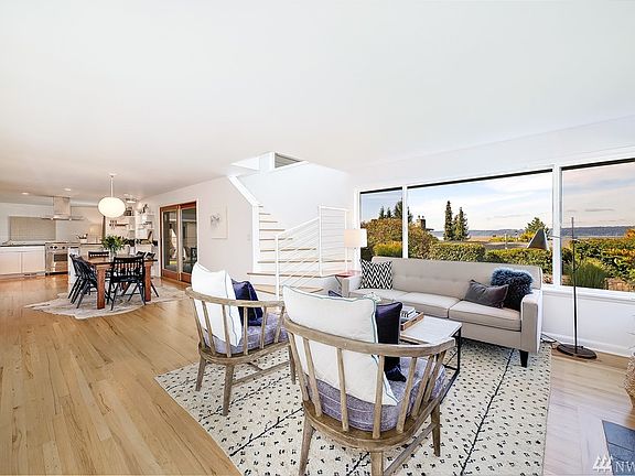 Another angle of the living room showcasing the views and the convenient and modern, open floor plan.