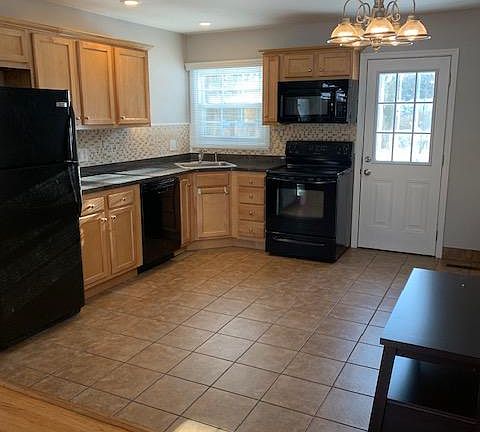 Kitchen - Maple cabinets & ceramic tile floor