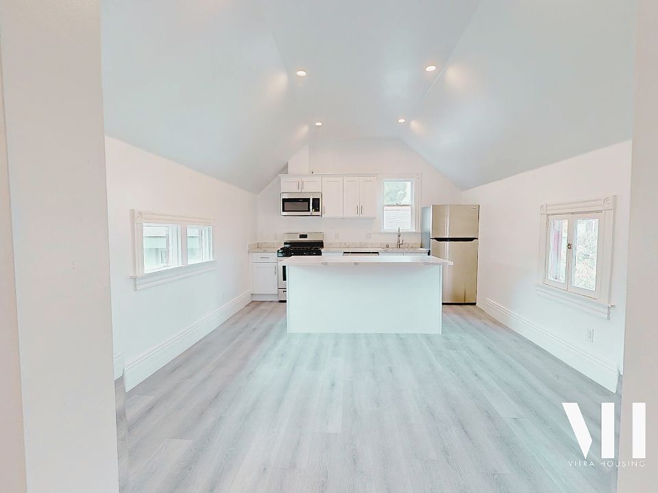 Four Bedroom, Three Bath | Kitchen, Dining, Living Area