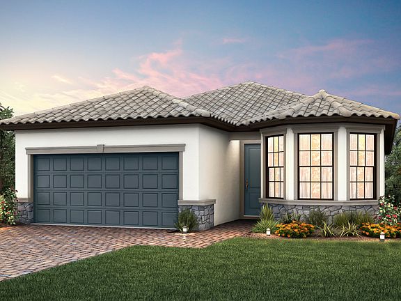 The Wyndham, a one-story family home with a 2 car garage, shown with Home Exterior FM2B