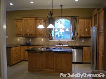 Custom Kitchen
						:
						Knotty pine kitchen cabinets, granite counters, 2 pantries and glass cabinets!