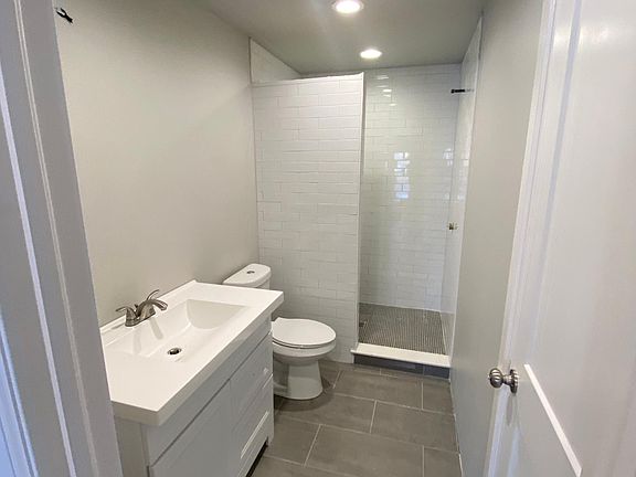 All new bathroom, new vanity, new fixtures, walk in tile shower