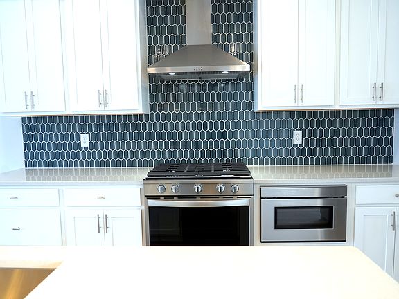 Tile backsplash, granite countertops