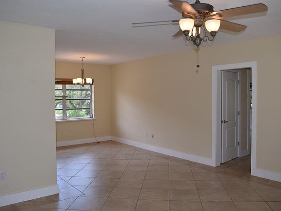 Living room with dining room- tiled floors throughout