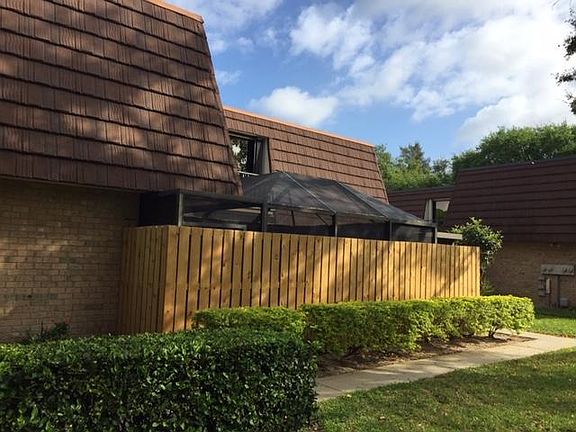 South Side next to large grassy area.