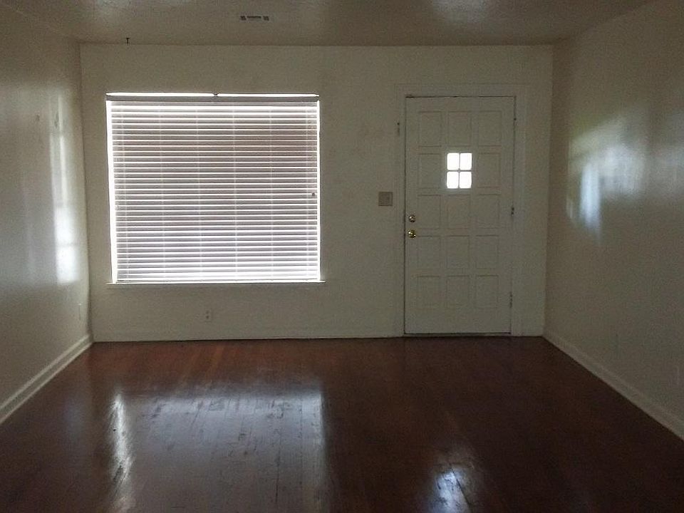 Beautiful wood floors in the three bedrooms, living and dining rooms.