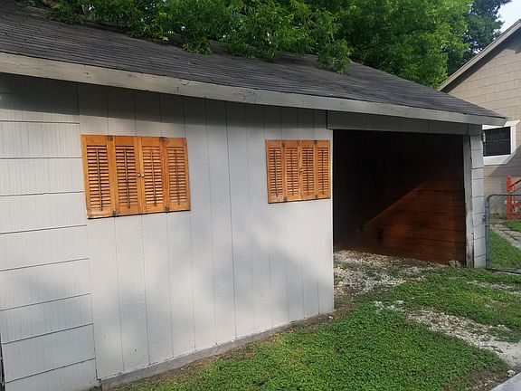 Garage with large storage unit attached