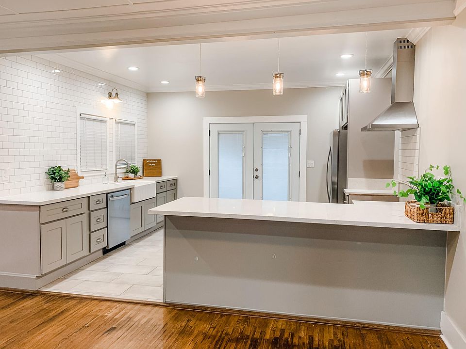 Open concept kitchen with farmhouse sink