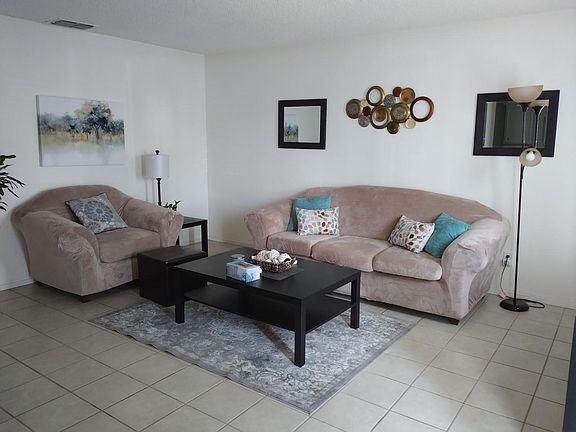 Living room area of unit 103