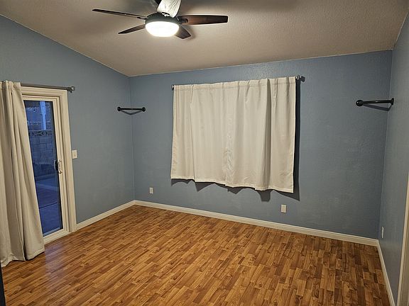 Bedroom 1 with sliding door to backyard
