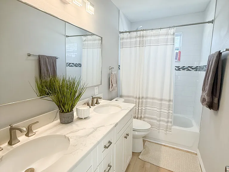 Bathroom with Dual Vanity and Quartz Countertops