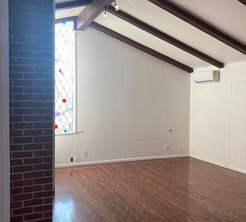 High ceilings and hardwood floors