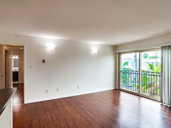 5th image of 5959 E Naples Plz Unit 209