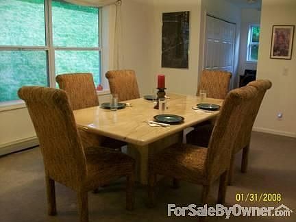 Formal Dining Room : Washer/Dryer close by, but hidden from view.