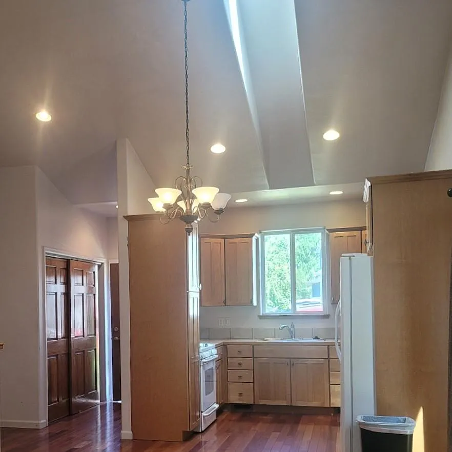 Entry and Kitchen/dining area - see next photo for new appliances, skylight and cathedral ceilings - 28 Gamba Dr