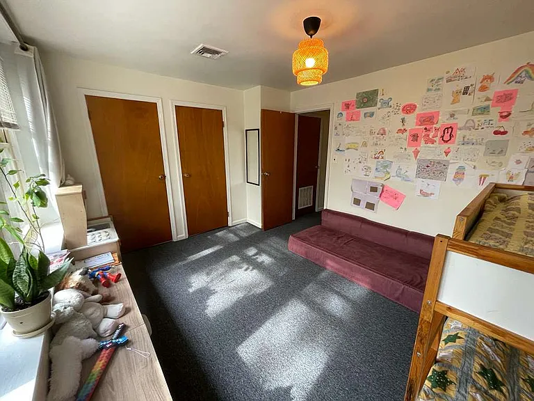 Master Bedroom (two doors on the left open to a large cabinet)