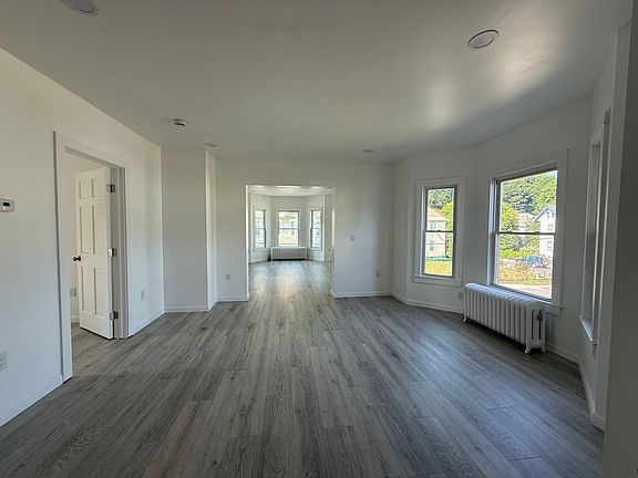 Open floor from kitchen, dining space, to the living room