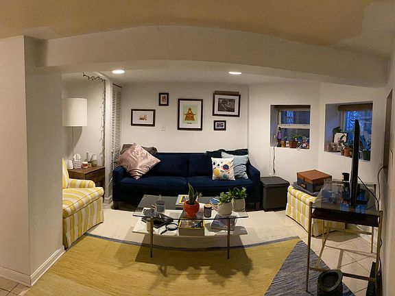 Panorama of the living room how I have it set up. Cable jack is behind the yellow striped chair.