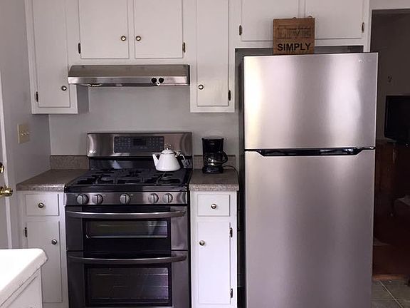 all new stainless appliances cabinets all stocked with cooki