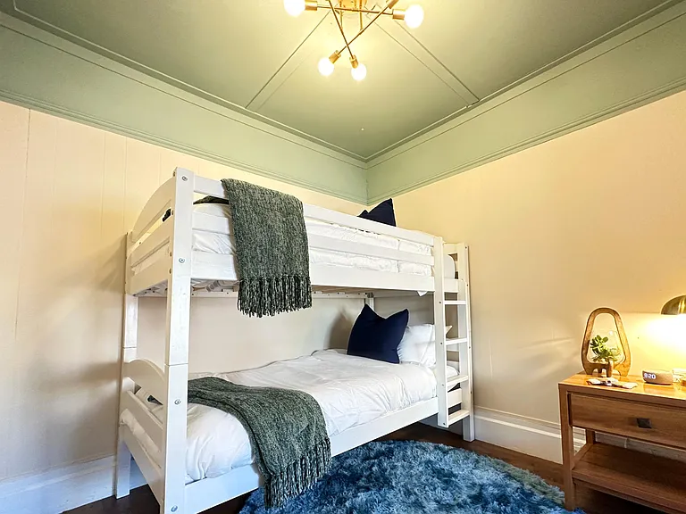 Interior design focuses on highlighting the charming features in this historic home -- like the high ceilings!