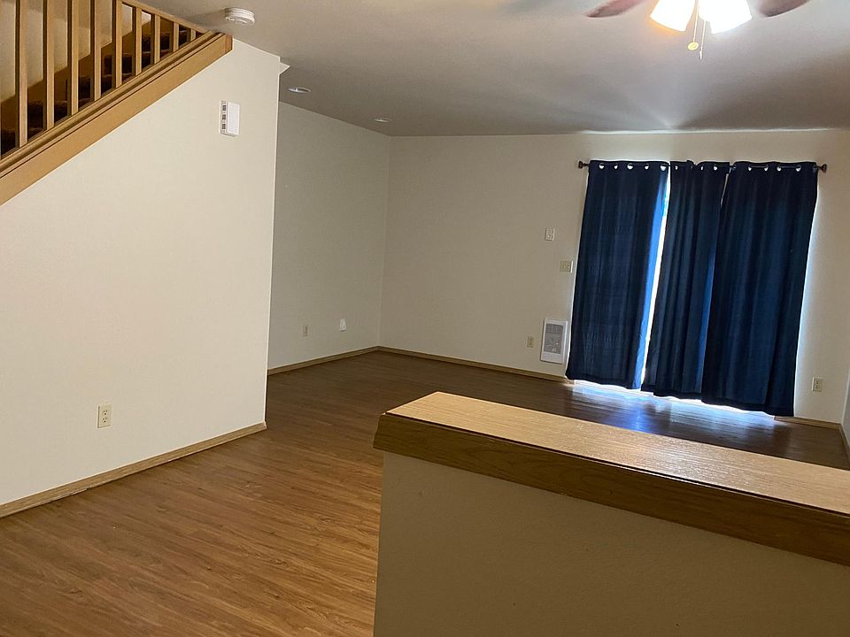 Living area with back door to patio
